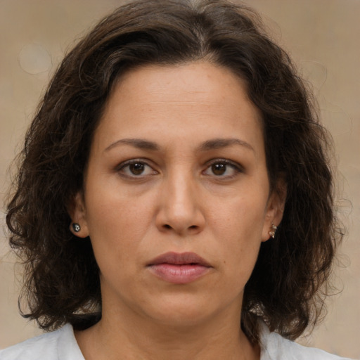Neutral white adult female with medium  brown hair and brown eyes