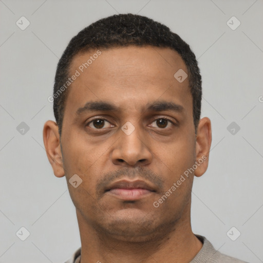 Neutral latino young-adult male with short  black hair and brown eyes
