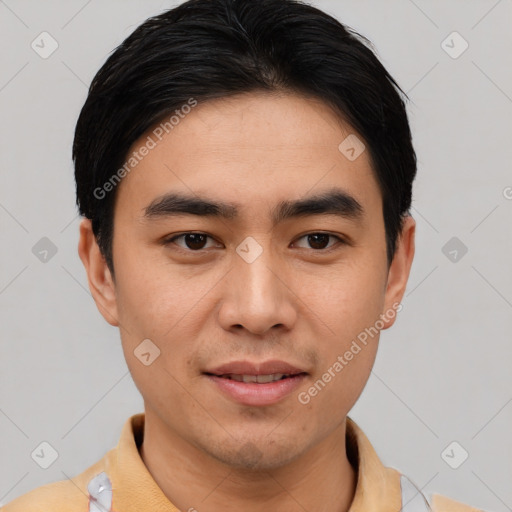 Joyful white young-adult male with short  black hair and brown eyes