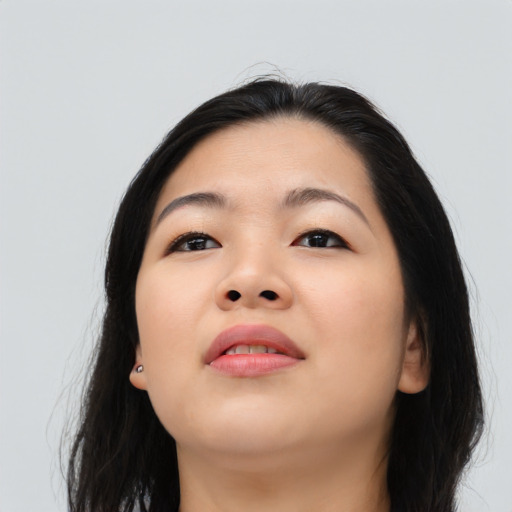 Neutral asian young-adult female with long  black hair and brown eyes