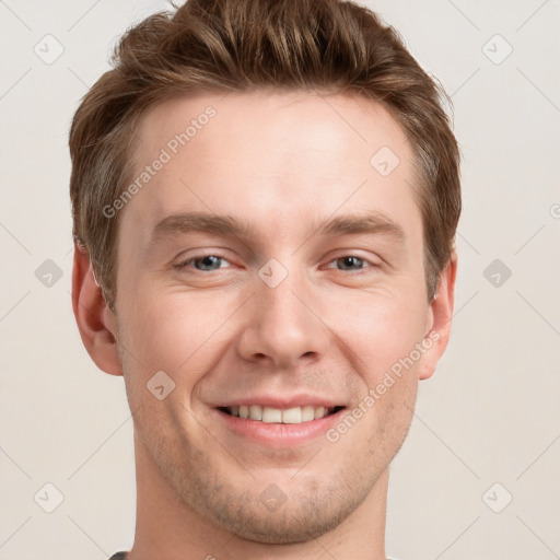 Joyful white adult male with short  brown hair and grey eyes