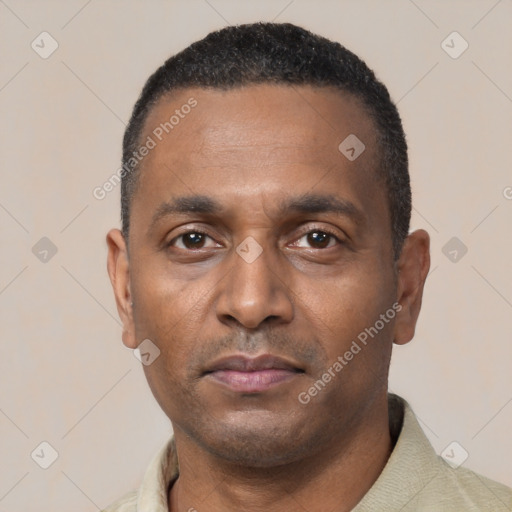 Neutral black young-adult male with short  black hair and brown eyes