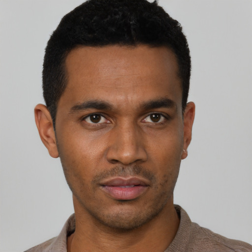Neutral black young-adult male with short  black hair and brown eyes
