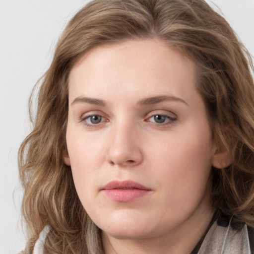 Neutral white young-adult female with long  brown hair and grey eyes