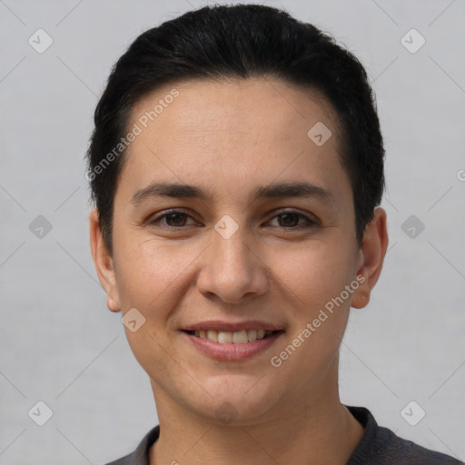 Joyful white young-adult female with short  brown hair and brown eyes