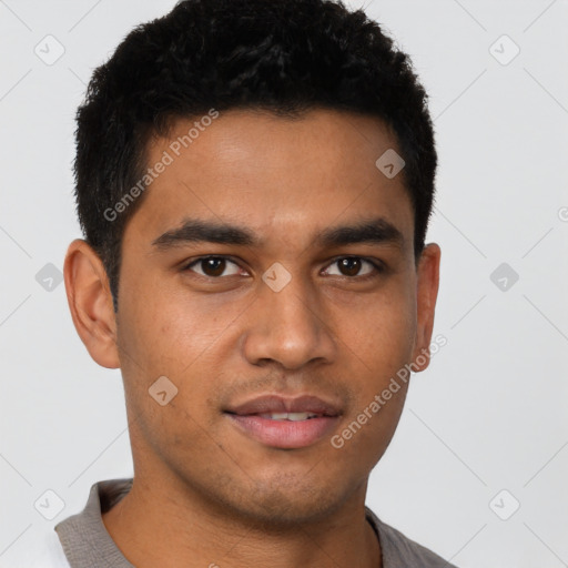 Joyful latino young-adult male with short  black hair and brown eyes