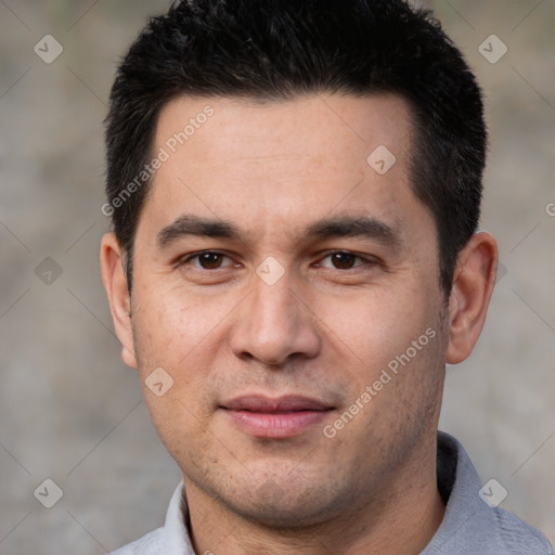 Joyful white adult male with short  black hair and brown eyes