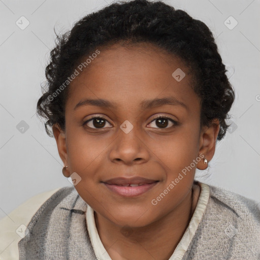 Joyful black child female with short  brown hair and brown eyes