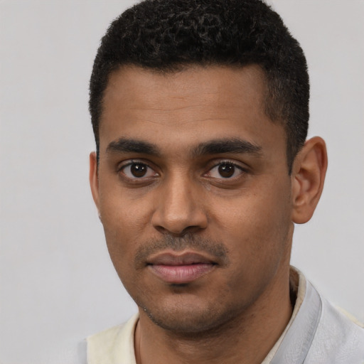 Neutral black young-adult male with short  black hair and brown eyes