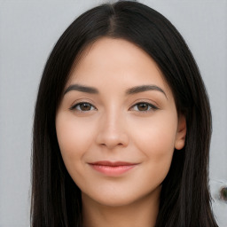 Joyful white young-adult female with long  black hair and brown eyes