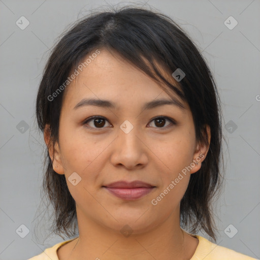 Joyful asian young-adult female with medium  brown hair and brown eyes