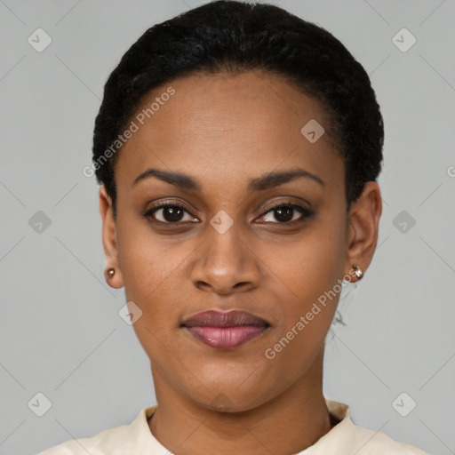 Joyful black young-adult female with short  black hair and brown eyes