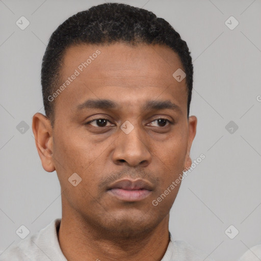 Neutral black young-adult male with short  black hair and brown eyes