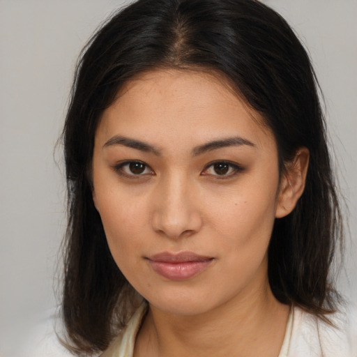 Neutral latino young-adult female with medium  brown hair and brown eyes