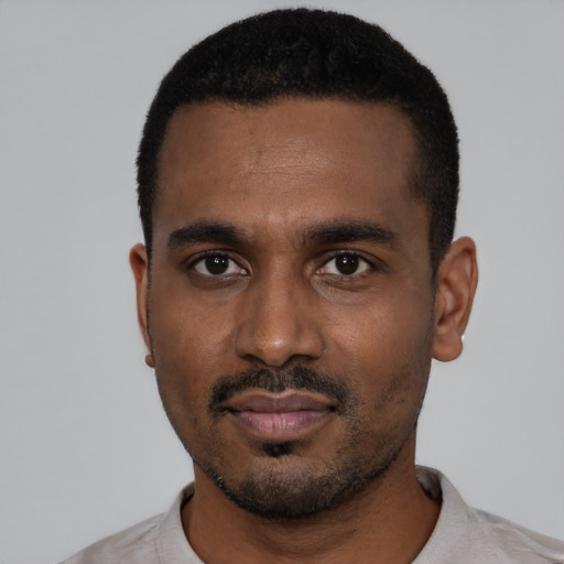 Neutral black young-adult male with short  black hair and brown eyes