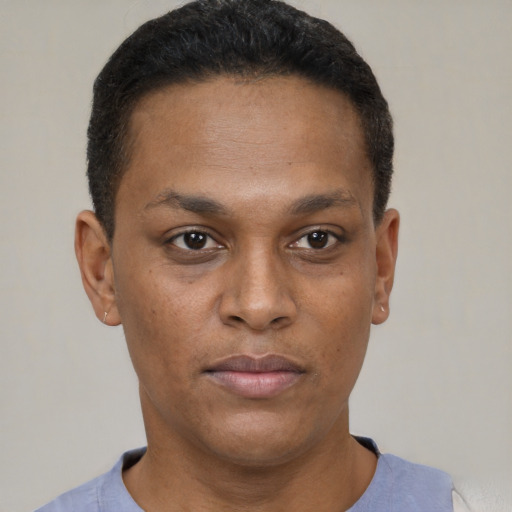 Neutral black young-adult male with short  brown hair and brown eyes