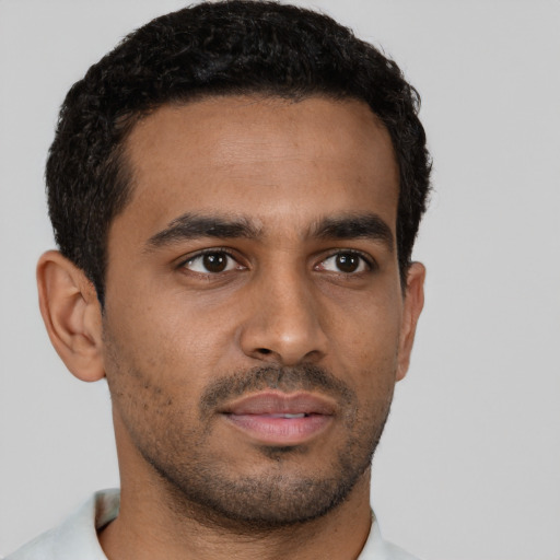 Neutral black young-adult male with short  brown hair and brown eyes