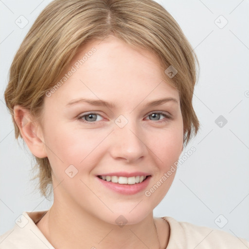 Joyful white young-adult female with medium  brown hair and blue eyes