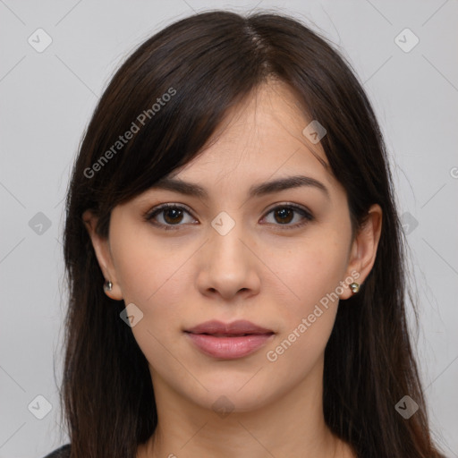 Neutral white young-adult female with long  brown hair and brown eyes