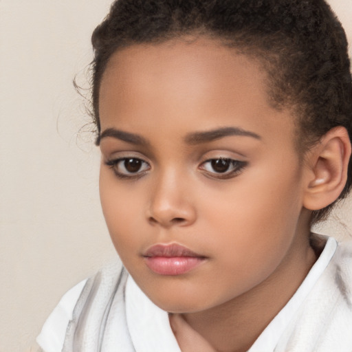 Neutral latino child female with medium  brown hair and brown eyes