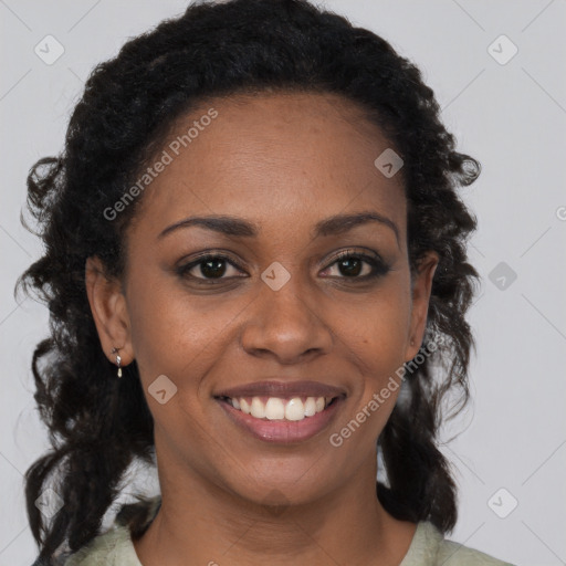 Joyful black young-adult female with medium  brown hair and brown eyes