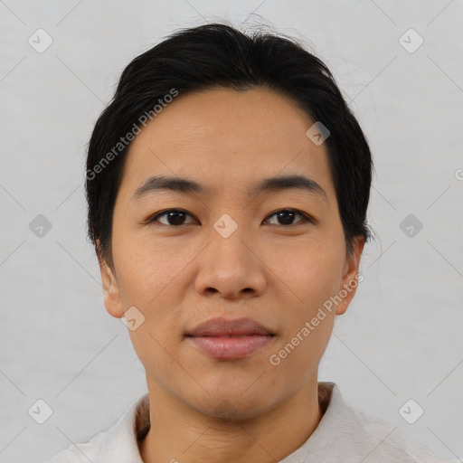 Joyful asian young-adult male with short  black hair and brown eyes