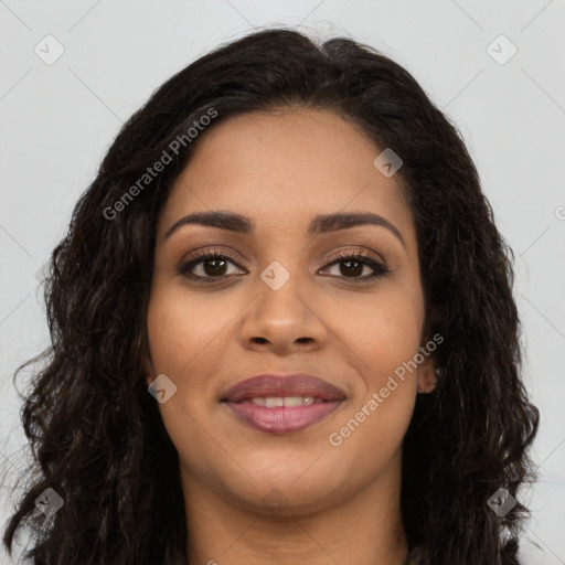 Joyful latino young-adult female with long  black hair and brown eyes