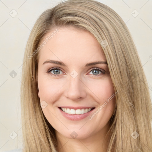 Joyful white young-adult female with long  brown hair and green eyes