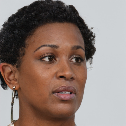 Neutral black young-adult female with short  brown hair and brown eyes