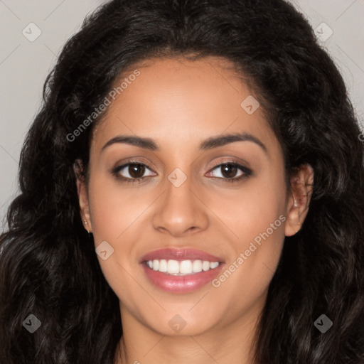 Joyful latino young-adult female with long  black hair and brown eyes