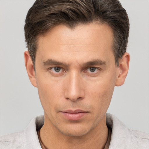 Neutral white adult male with short  brown hair and brown eyes