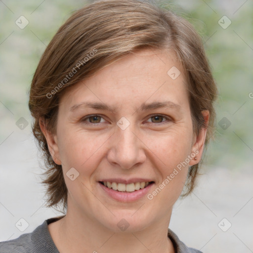 Joyful white adult female with medium  brown hair and grey eyes