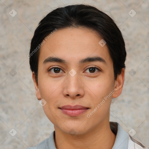 Joyful asian young-adult female with short  black hair and brown eyes