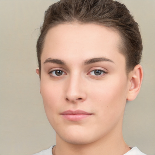 Neutral white young-adult female with short  brown hair and brown eyes