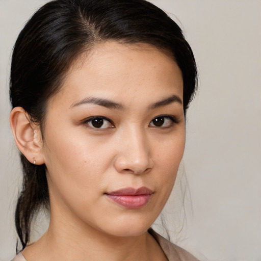 Neutral white young-adult female with medium  brown hair and brown eyes