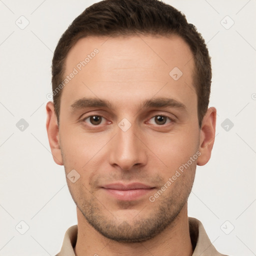 Joyful white young-adult male with short  brown hair and brown eyes