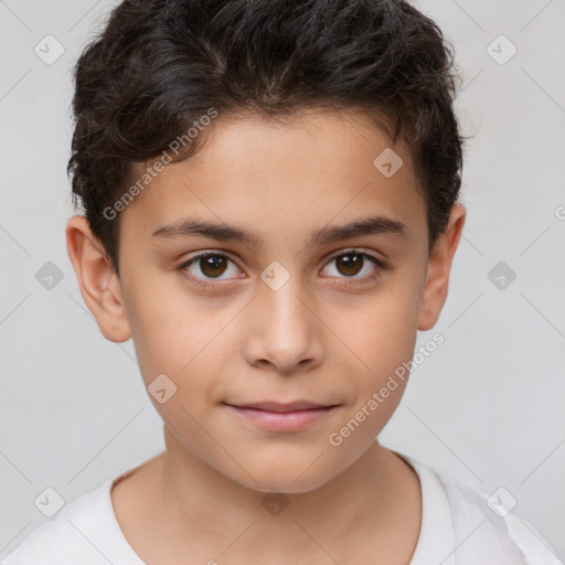 Joyful white child male with short  brown hair and brown eyes