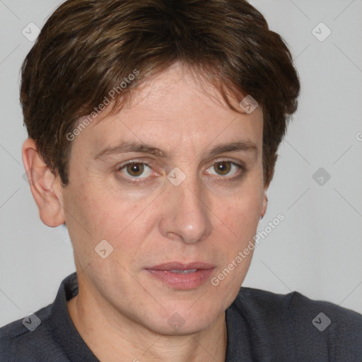 Joyful white adult male with short  brown hair and grey eyes