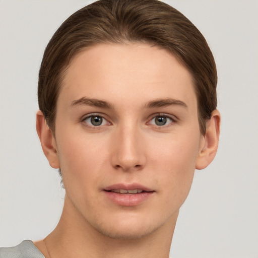 Neutral white young-adult female with short  brown hair and brown eyes