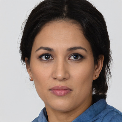 Neutral latino young-adult female with medium  black hair and brown eyes