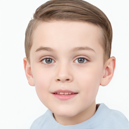 Joyful white child male with short  brown hair and brown eyes