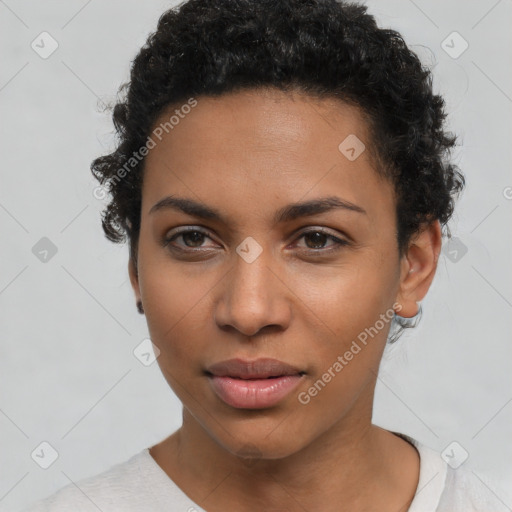 Joyful latino young-adult female with short  brown hair and brown eyes