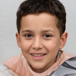 Joyful white child male with short  brown hair and brown eyes