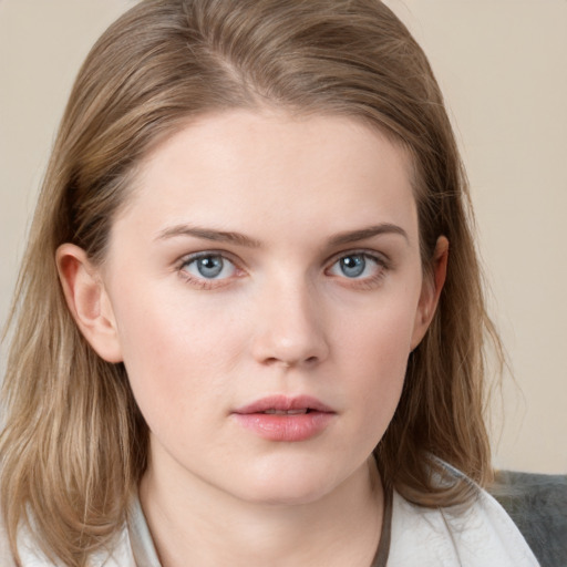 Neutral white young-adult female with medium  brown hair and grey eyes