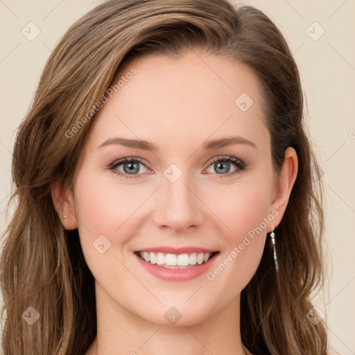 Joyful white young-adult female with long  brown hair and green eyes