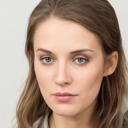 Neutral white young-adult female with long  brown hair and grey eyes