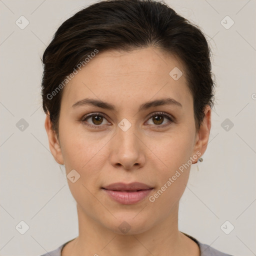 Joyful white young-adult female with short  brown hair and brown eyes