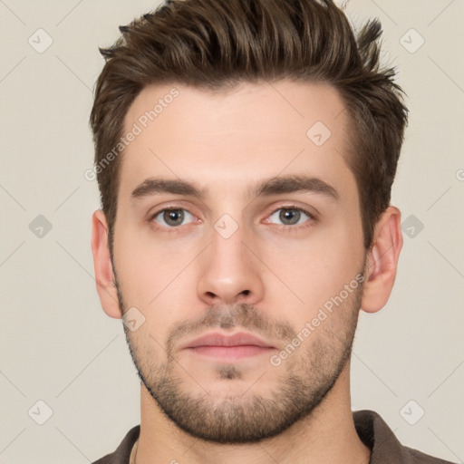 Neutral white young-adult male with short  brown hair and brown eyes