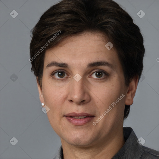 Joyful white adult female with short  brown hair and brown eyes