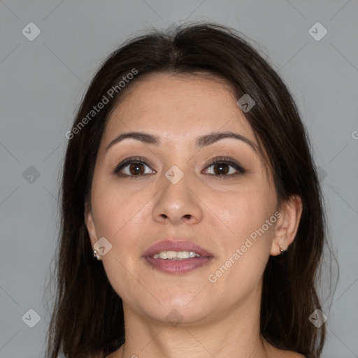 Joyful white adult female with medium  brown hair and brown eyes